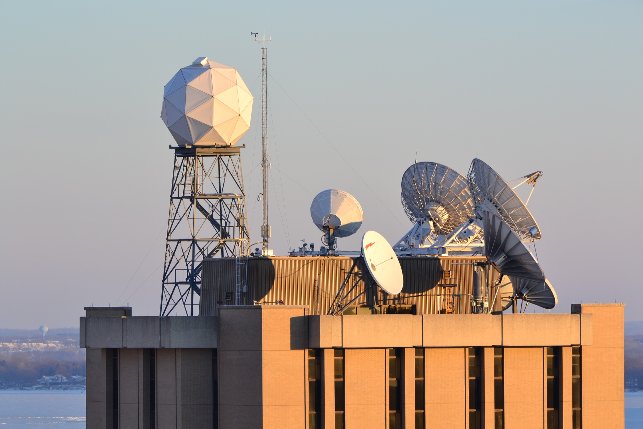 Satellite receiving dishes and a radome on the SSEC rooftop at UW–Madison