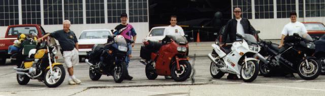 Everyone near their bikes