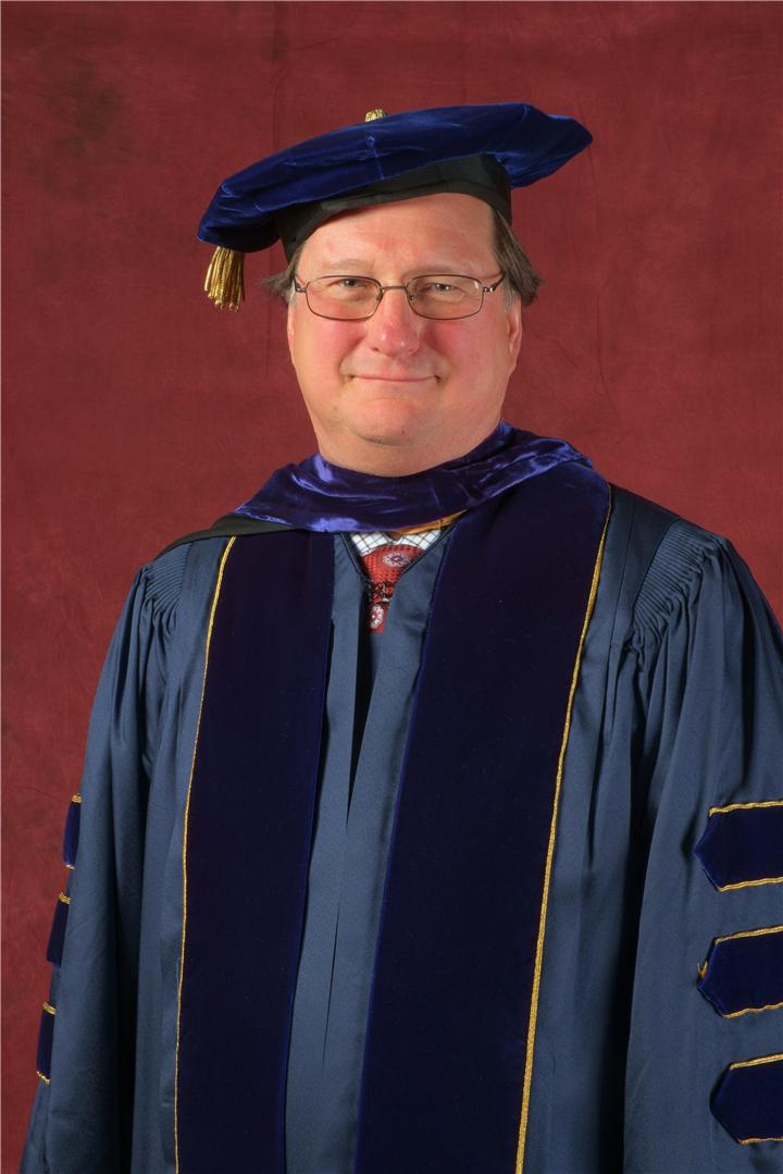 Mark Hill in Ph.D. Robes, May 2014